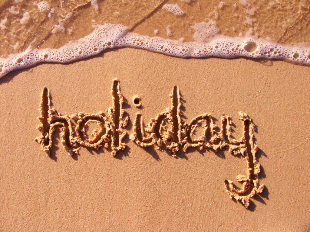 Holiday in het zand geschreven